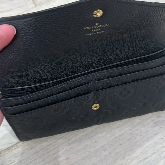 Authentic the Monogram Empreinte Leather wallet - like new - Picture 5 of 7